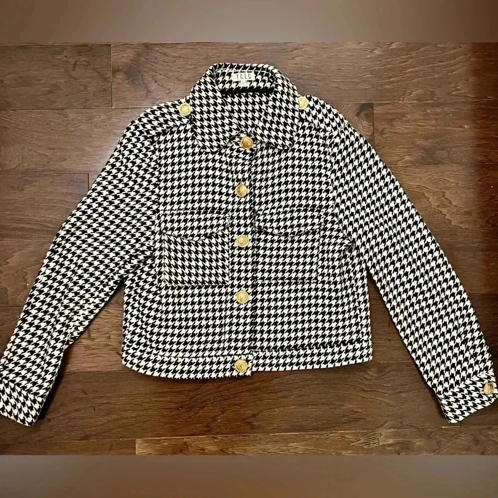 Black and white patterned, gold button down blazer. Size large.
